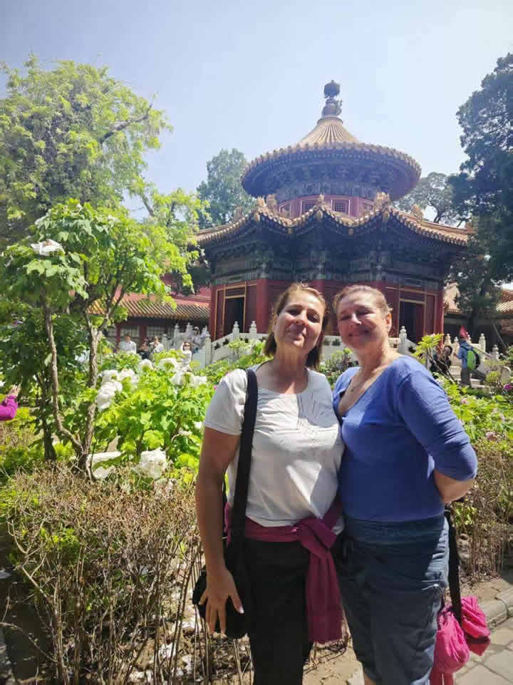 Photos of tourists visiting attractions such as the Forbidden City, Mutianyu Great Wall, and Summer Palace in Beijing.(pic7)